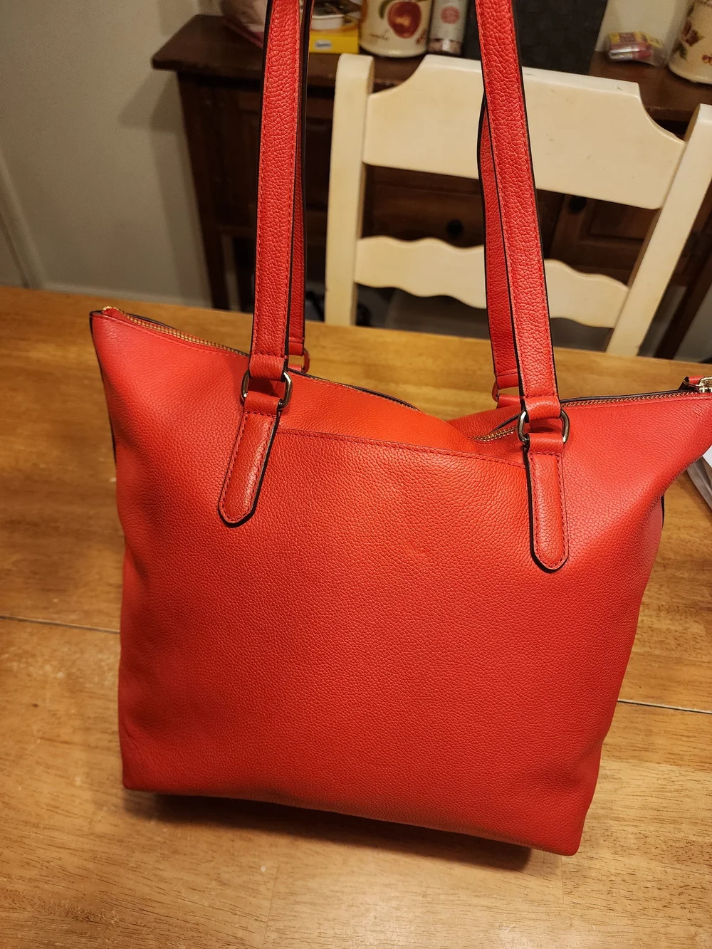 This Kate Spade Larchmont Avenue Logo Penny Tote in chili red